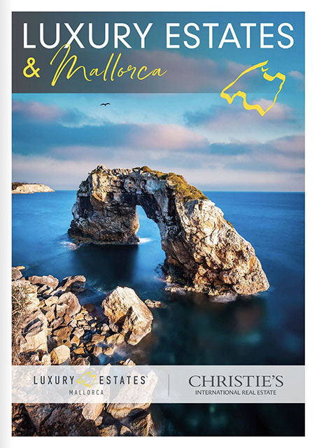 Magazine cover titled "Luxury Estates & Mallorca" features a scenic rocky coastline with a natural stone arch over the sea.